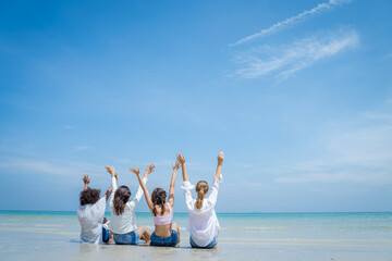 Group of girls on beach having fun,Enjoying summer vacation on a beach.