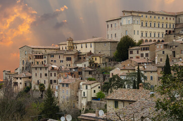 Naklejka premium View of the historic center of Todi town in Umbria at sunset Italy