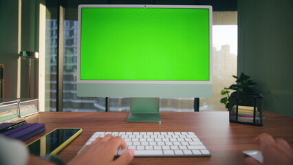 Unknown woman typing mockup computer closeup. Director arms working green screen