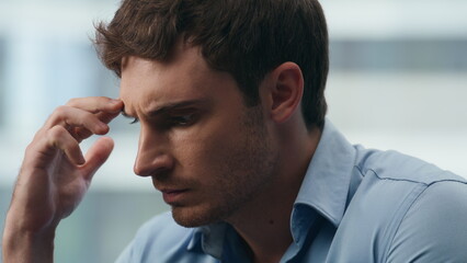 Stressed corporate worker analyzing data statistics closeup. Man counting office