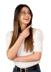 Portrait of excited girl pointing copy space. Isolated white background, transparent png. Brunette caucasian young woman smiling and showing with her finger. Advertising concept idea.