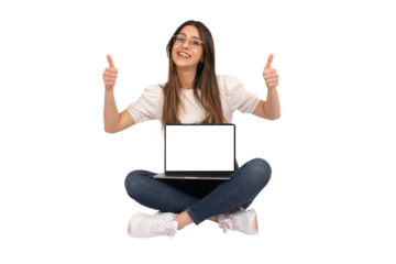 Transparent png image of cheerful woman sitting on the ground with the computer on her lap recommending website. Showing thumb up with two hands. Smiling to camera. White blank screen laptop mock up.