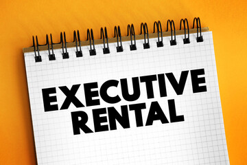 Executive rental - fully furnished and equipped residential apartments, houses or condominiums available for rent on a temporary basis, text concept on notepad