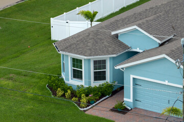 Wide garage double door and concrete driveway of new modern american house