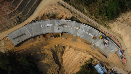 Aerial view of development of new road construction or overpass under construction. Top view from a...