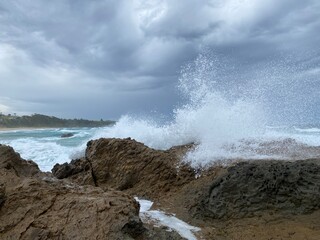 waves crashing on rocks