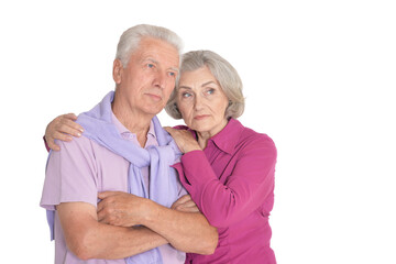 Portrait of sad senior couple isolated