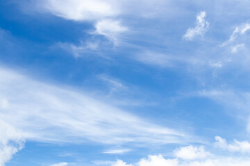 Naklejka na ściany i meble Blue color sky with white fluffy cloud background