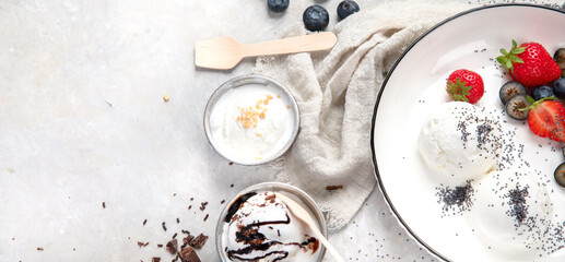 Ice cream assortment on neutral background.