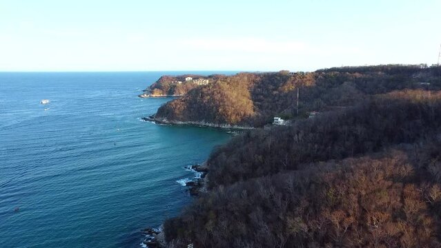 4k video of oaxaca huatulco beach in summer mexico travel destination holidays in america place to rest tropical national park with plants and trees and a deep blue water in the pacific ocean