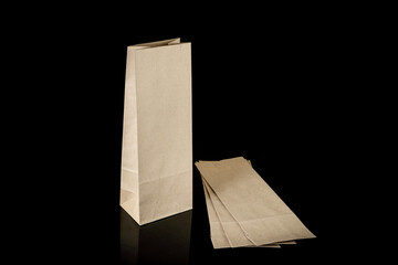 Set of paper bags for shopping on black background. Mockup for design