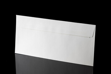 White craft envelope isolated on black background