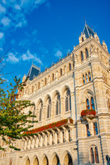 Naklejka premium Vienna, Austria - Main facade of City Hall, old Rathaus, in Vienna with many figures, art and sculptures