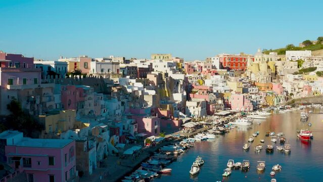 Calm port of Procida aerial view near the ocean in summer season