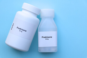 Prednisone pill in white bottle, pill stock