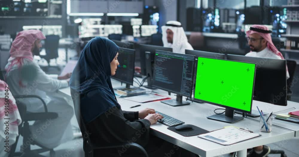 Aufkleber group of multicultural middle eastern men and women working in research center, collaborating on an 