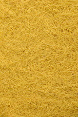 Italian raw pasta filini vermicelli from durum wheat. Food and ingredientes background.