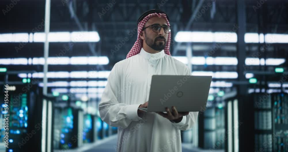 Aufkleber portrait of a middle eastern data center administrator wearing traditional white clothes, using lapt