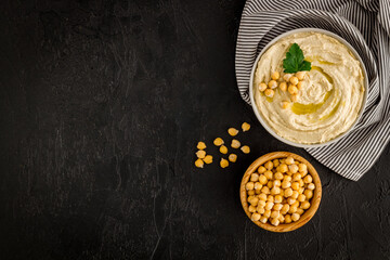 Vegetarian dish - hummus with olive oil and chickpeas