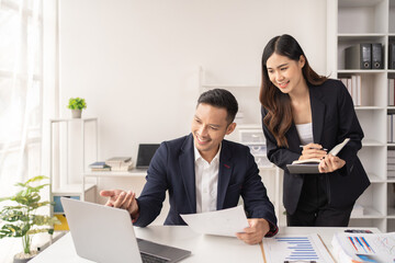 Business women and man working in the office