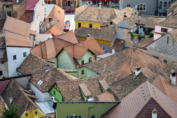 Towers and rooftops of medieval city of Sighishoara in Transylvania, Romania. Sighisoara old town...