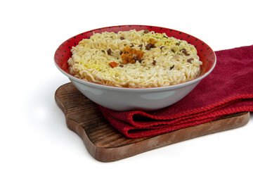 Instant vermicelli in a plate on white