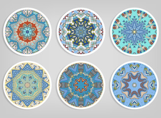 Decorative round ornaments set, isolated elements. Colorful mandala, stylized flower. Abstract geometric doodle patterns for plate decoration, fabric print,  business or greeting card design