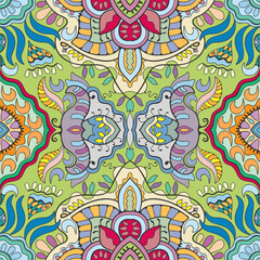 Hand drawn seamless graphic pattern, colorful artistic background with floral and geometric elements. Doodle ethnic mandala ornament for textile fabric, paper print. Surface texture 