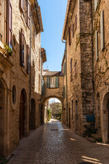 Fototapeta na wymiar Street and passage in Vézénobres, a small medieval village in Gard, Occitanie, France