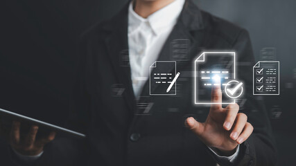 Businessman touch on symbol of check mark signifies that the adheres to international quality control standards certified  ISO. The company's product certificate confirms the necessary requirements.