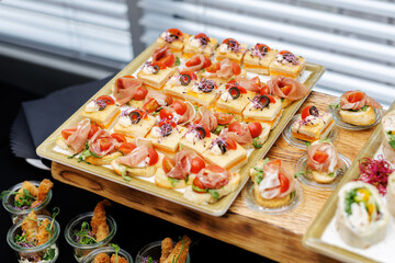 Small sandwiches at an event catering, hotel buffet