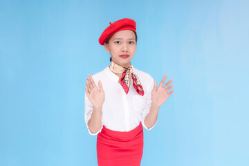 A flight attendant or stewardess reminding the passengers to settle. A hostess informing everyone...