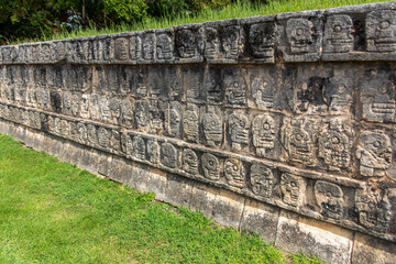 Fototapeta na wymiar The Tzompantli of Chichen Itza, which is the altar where a group of skulls were mounted in public view in order to honor the gods, is an ancient Mayan ruin.