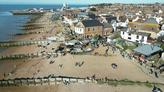 Reverse Aerial Shot of Whitstable Oyster Company Building Restaurant Busy People