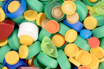 Variety of colorful plastic screw caps background