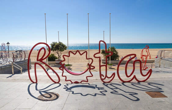 Sign of the town of Rota, Cadiz, Andalusia, Spain in front of the beach
