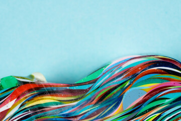 Bright color artwork on turquoise surface