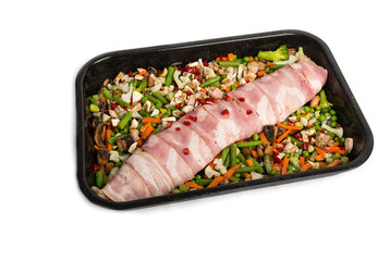 Keto Stuffed Chicken Breast wrapped up in bacon with vegetable