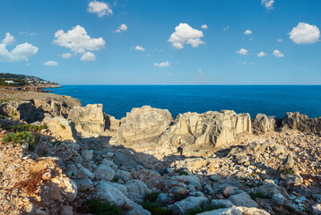 Fototapeta na wymiar Rocky coast near Porto Miggiano Beach (Grotta delle Ancore) in Santa Cesarea Terme, Salento Adriatic sea coast, Puglia, Italy