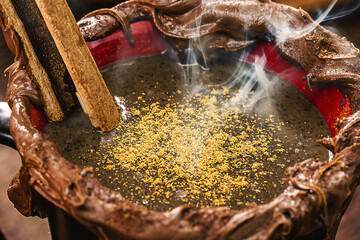 cup of vegan hot chocolate, steaming and smoky hot drink, served at Christmas and New Year made with cocoa, cinnamon, hazelnut and chestnuts, MACRO PHOTOGRAPHY