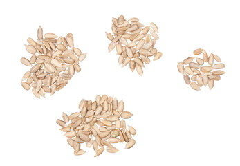 Peeled sunflower seeds isolated on white, top view