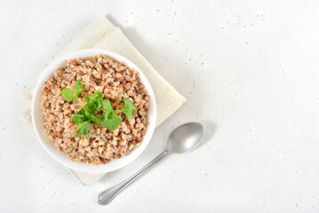Buckwheat porridge in white bowl