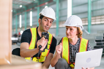 Engineer with plan under checking the industry . Professional engineering and manager, logistic worker warehouse, check in factory, warehouse Workshop for factory operators.