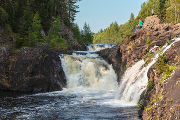 Kivach waterfall in Karelia on the Suna River. A natural attraction. Russia