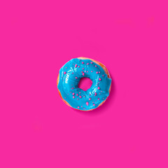 Glazed blue donut on a pink background. Generative AI