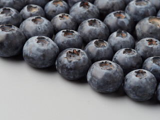Fresh organic blueberries in a bowl closeup view