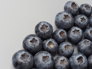 Fresh organic blueberries in a bowl closeup view