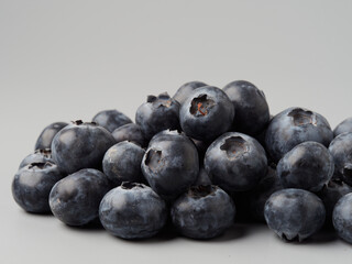 Fresh organic blueberries in a bowl closeup view