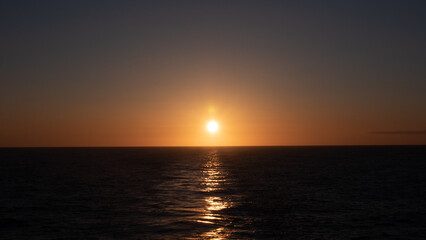 beautiful sunset at sea seascape. beautiful sunset at sea water. photo of sunset at sea. sunset