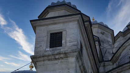 Architectural details of Yeni Cami or New Mosque. The dome of the New Mosque on the Galata Bridge on the Golden Horn in the Eminonu district  in Istanbul Turkey